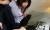 制服を脱がされておっぱいを露わにされるOLのエロ画像016